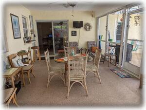 Screened Florida Room wth Dining Table