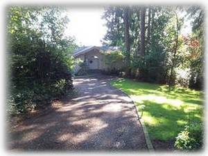 Long driveway leads to the private setting of Agate Beach House