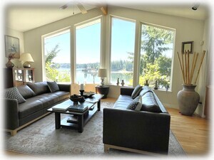 Living room and view with dining and kitchen beyond