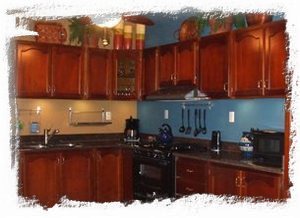 Full service kitchen w/gorgeous granite counters & bar area w/ocean view