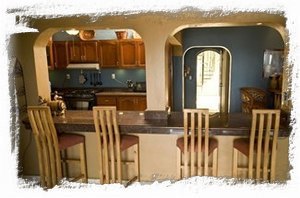 Granite bar area connected to kitchen