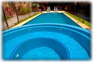 The jacuzzi, which sits at the end of the pool.