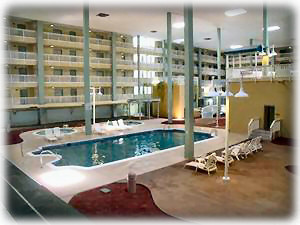 Indoor pool area with jaccuzzi and baby pool