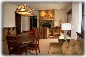 Lower Family Room w/wet bar, daybed, 50' hdtv,gas fireplace, game table, hot tub