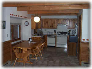 Fully-equipped kitchen with eating area