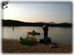 Our family enjoying floating and kayaking at White Lake State Park