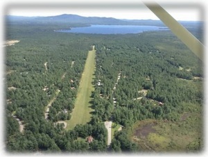 "Windsock Village" grass airstrip looking toward Ossipee Lake