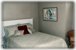 Queen size second bedroom-decorated in beach theme