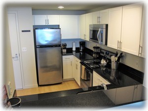 Kitchen with granite, stainless and breakfast bar for 2