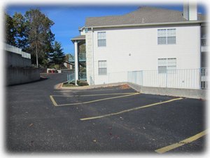 Parking is next to the building and right across the street