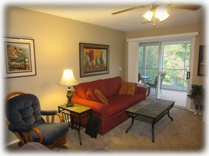 The livingroom also has a gliding rocker and queen sofa sleeper