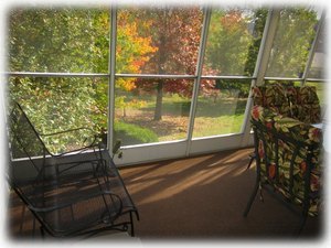 All of our Branson vacation condos have a gliding loveseat on a screened porch