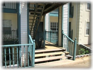 The walk in condo is on one level but the porch has 4 steps