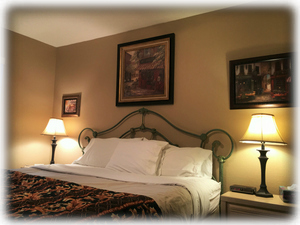 The guest bedroom also has a King bed, 32" HDTV, ceiling fan, & walk in closet