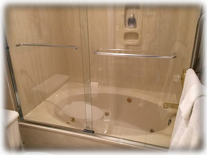 The master bedroom has an extra deep Jacuzzi whirlpool tub / shower in the tub
