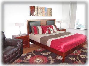 Spacious master bedroom with comfortable king bed