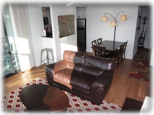 Light filled living space with dining area off kitchen