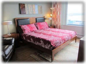 King bedroom w/ en suite bath and water views