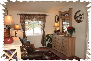 Den with CD Player and leather couch and tons of books.