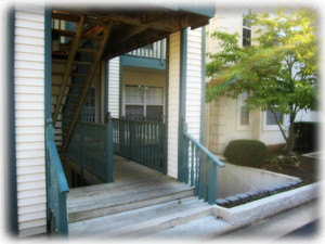 We are a walk in but our front porch has 3 steps. The bedrooms are down a flight