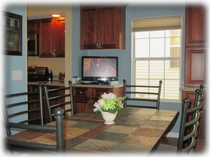 Your dining room seats 6 and has a 26" HDTV