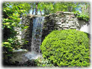 The waterfall is in the garden area behind the condos too.