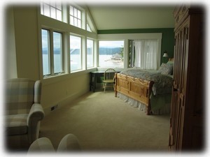Master bedroom- also has a sitting area with a fireplace.