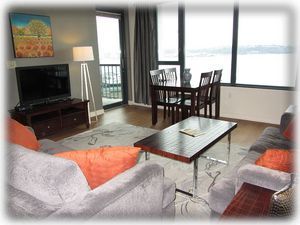 Spacious living room with water views