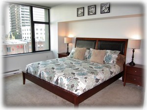 King bed with city views