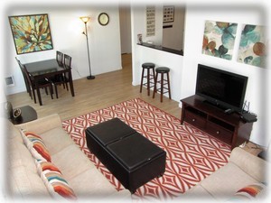 Living area and dining area just off kitchen