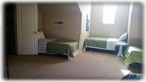 New bunk room has 10 twin beds in 1 large room (boy side)
