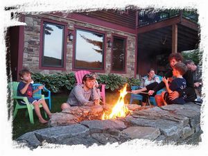 Toasting Marshmallows around the fire pit overlooking the lake.  This is heaven! 