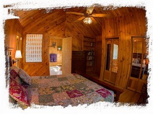 A Variety of Natural Wood Paneling Warms Two of the Bedrooms and the Living Room