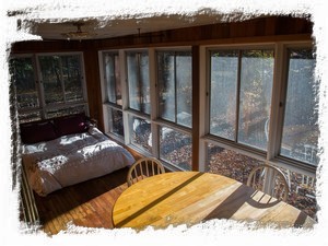 Sleeping porch with privacy curtain (warmer months only)