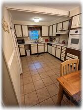 Fully-Equipped Kitchen Overlooking Side Yard