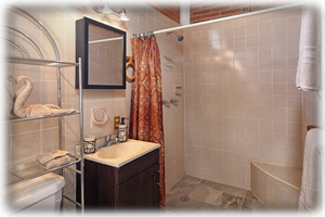 Bathroom with oversized shower; plush towels/bath sheets