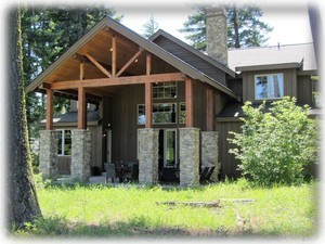 Back of home (taken before extended patio with fire pit)