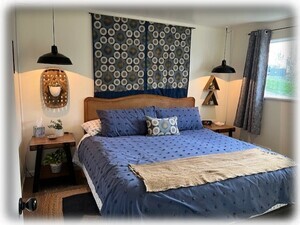 Main floor bedroom with king bed