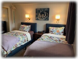 Second floor twin bedroom with ensuite 1/2 bath