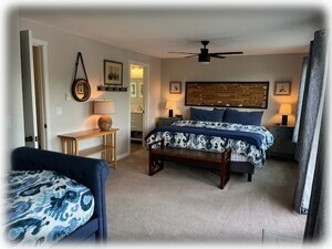 Second floor bedroom with king bed, trundle daybed and attached bath