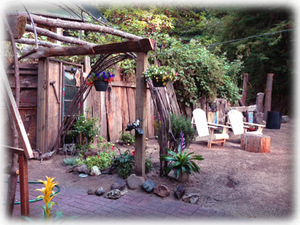 Relax in a lovely garden with fences by local artist