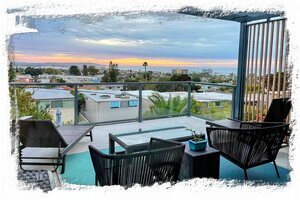 Soak in the San Diego sun on the balcony with chaise lounges & club chairs