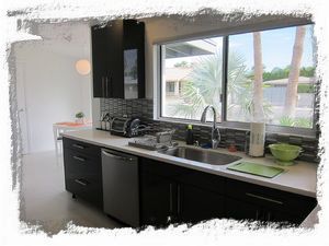 Ample counter space in our fully stocked and remodeled kitchen