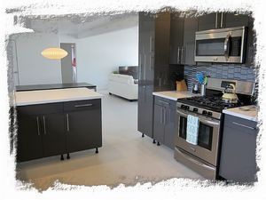 Kitchen opens up to main living area keeping the cook connected