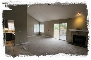 Large great room with 1 year old paint, carpet and molding