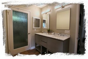 Primary bedroom suite has dual vanities