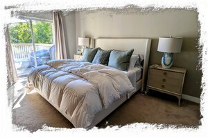 Primary bedroom has slider out to balcony/patio