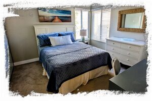 2nd bedroom features queen bed, large closet and dresser