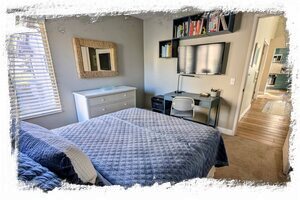 2nd bedroom also features work space with HDTV