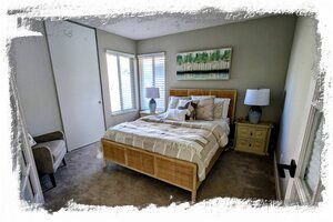 3rd bedroom has french doors, queen bed